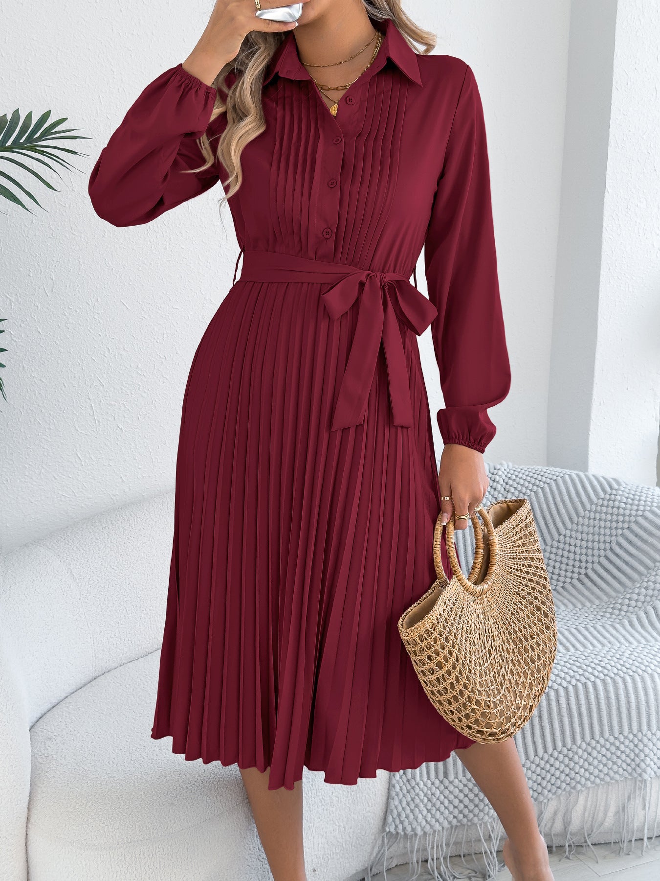 Solid color lapel long sleeved waist cinched pleated dress