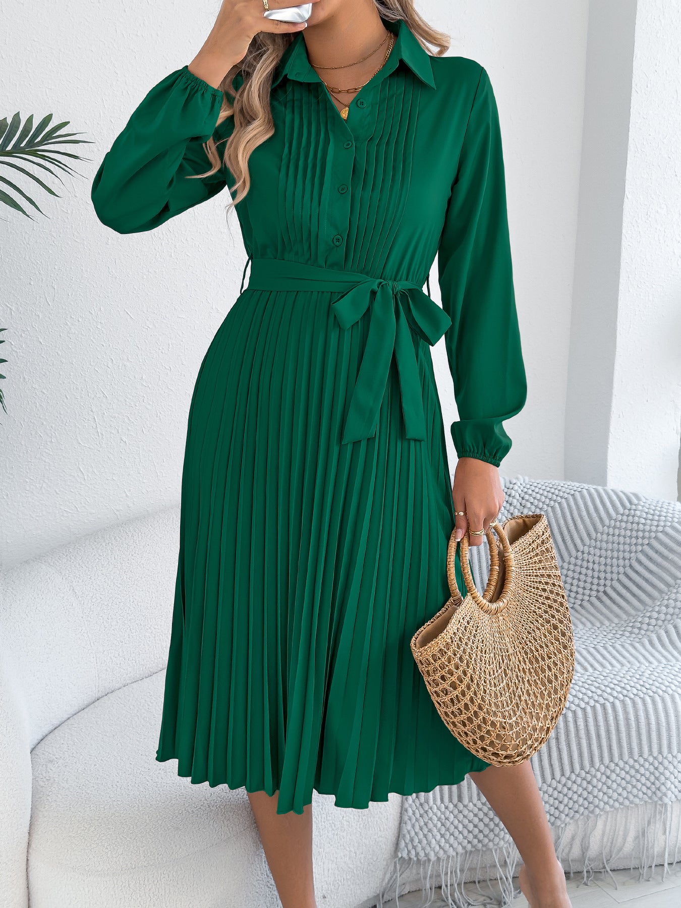 Solid color lapel long sleeved waist cinched pleated dress